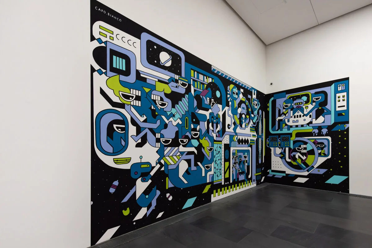 Trip 2075 installed across two walls inside MUDEC in Milan.